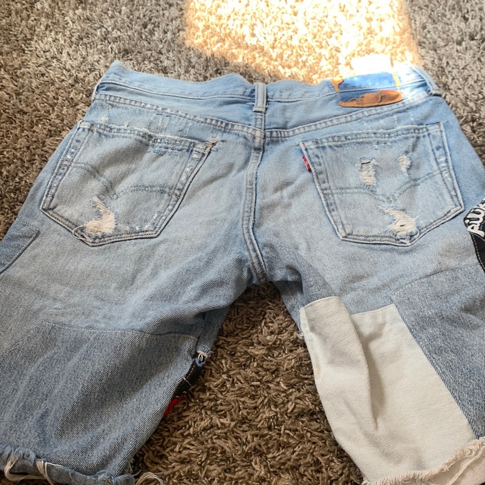 Blue ripped jean shorts